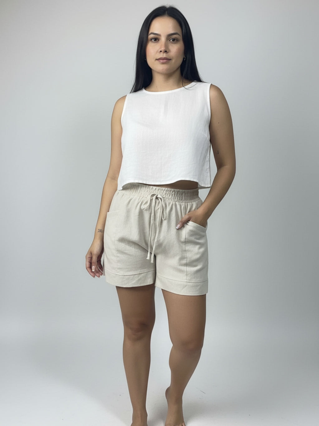 Short de linho Sanfona bolso para fora