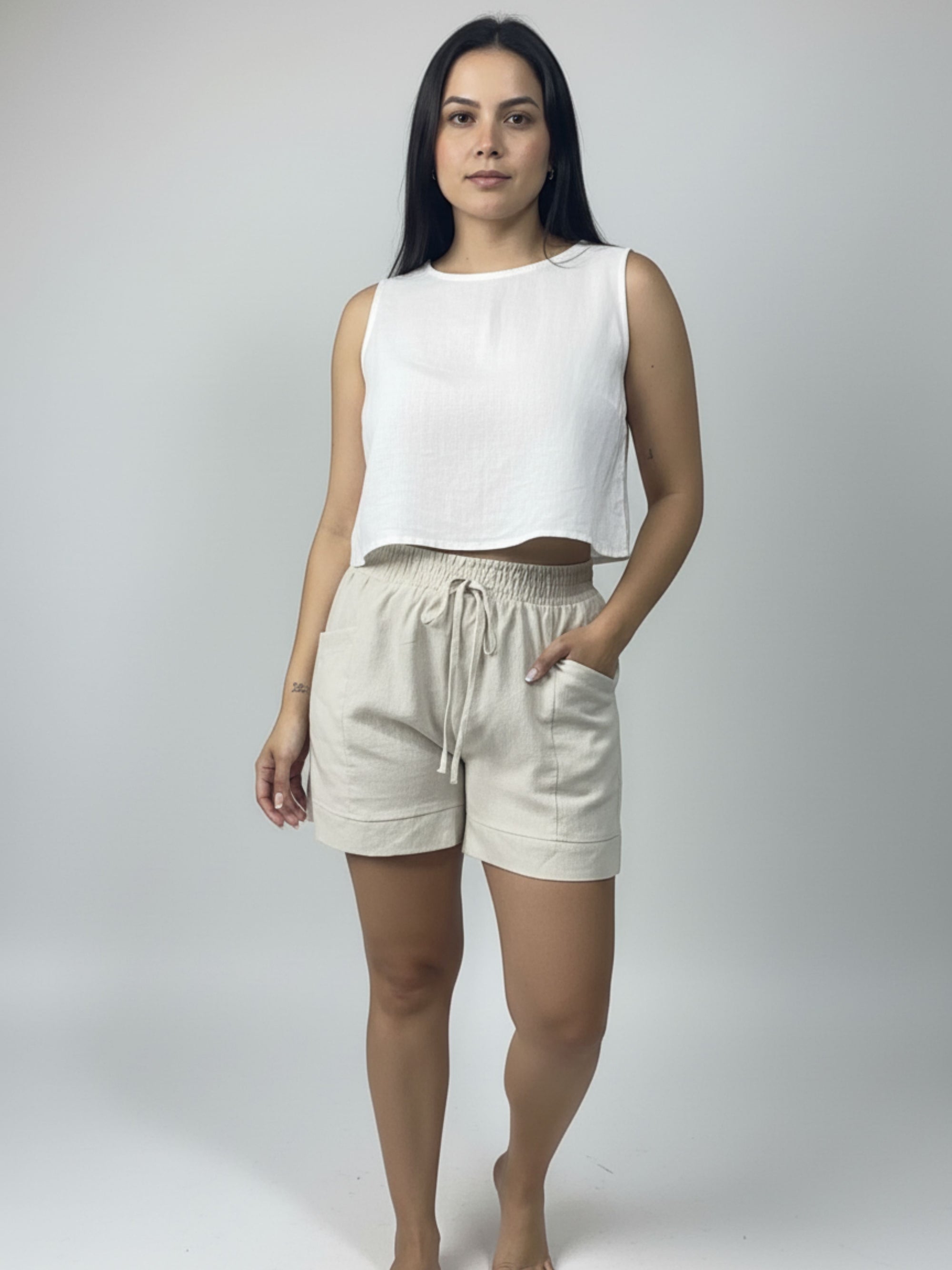 Short de linho Sanfona bolso para fora