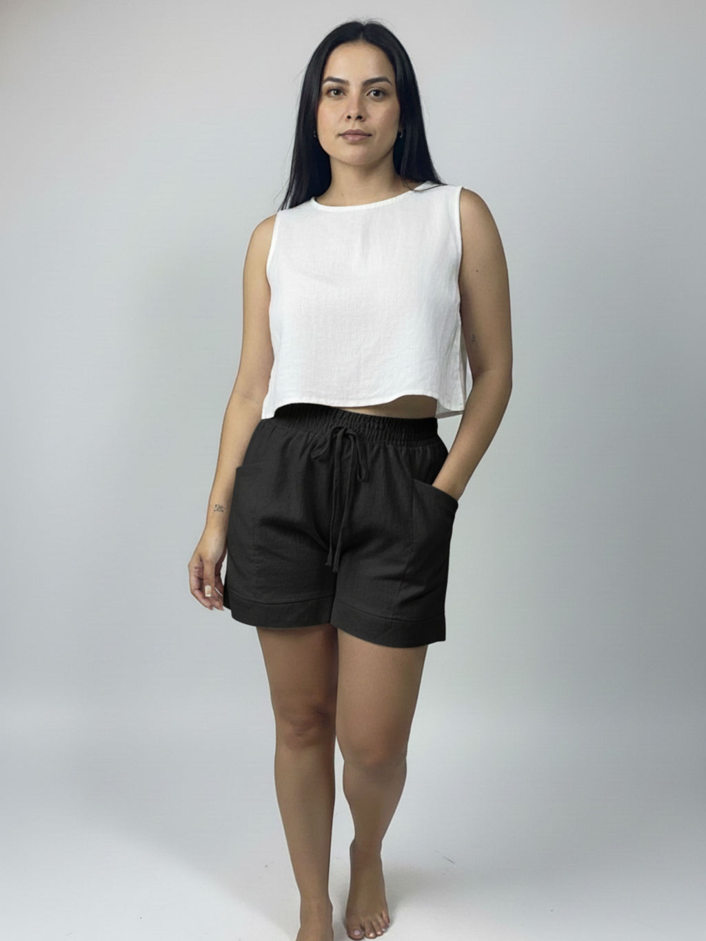 Short de linho Sanfona bolso para fora