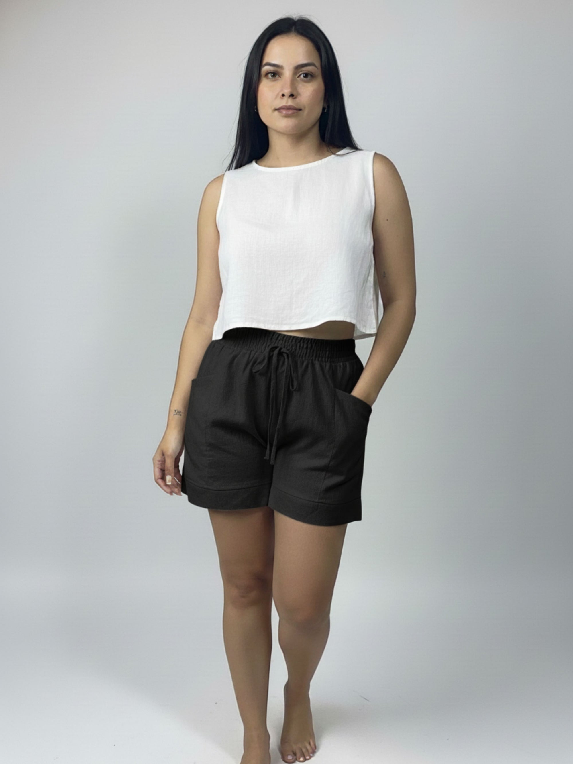 Short de linho Sanfona bolso para fora