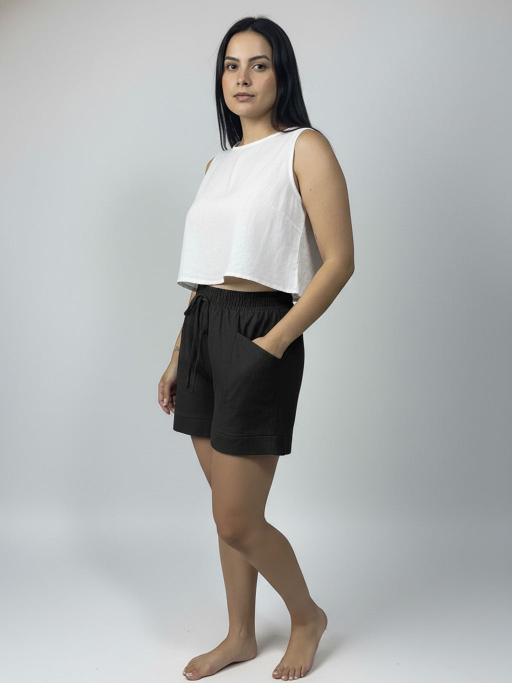 Short de linho Sanfona bolso para fora